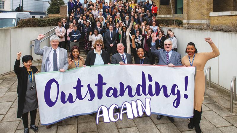 Team of Bexley practitioners celebrating with a sign that says 'Outstanding again'